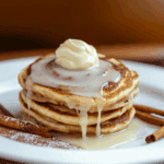 Fluffy Cinnamon Roll Pancakes with Cream Cheese Glaze